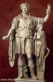 This statue depicts Dionysus with one of his sons and his traditonal bunch of grapes.